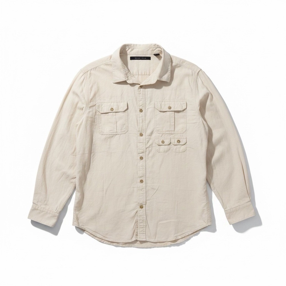 Sean John button-up shirt has dual chest pockets and branded gold-tone buttons.